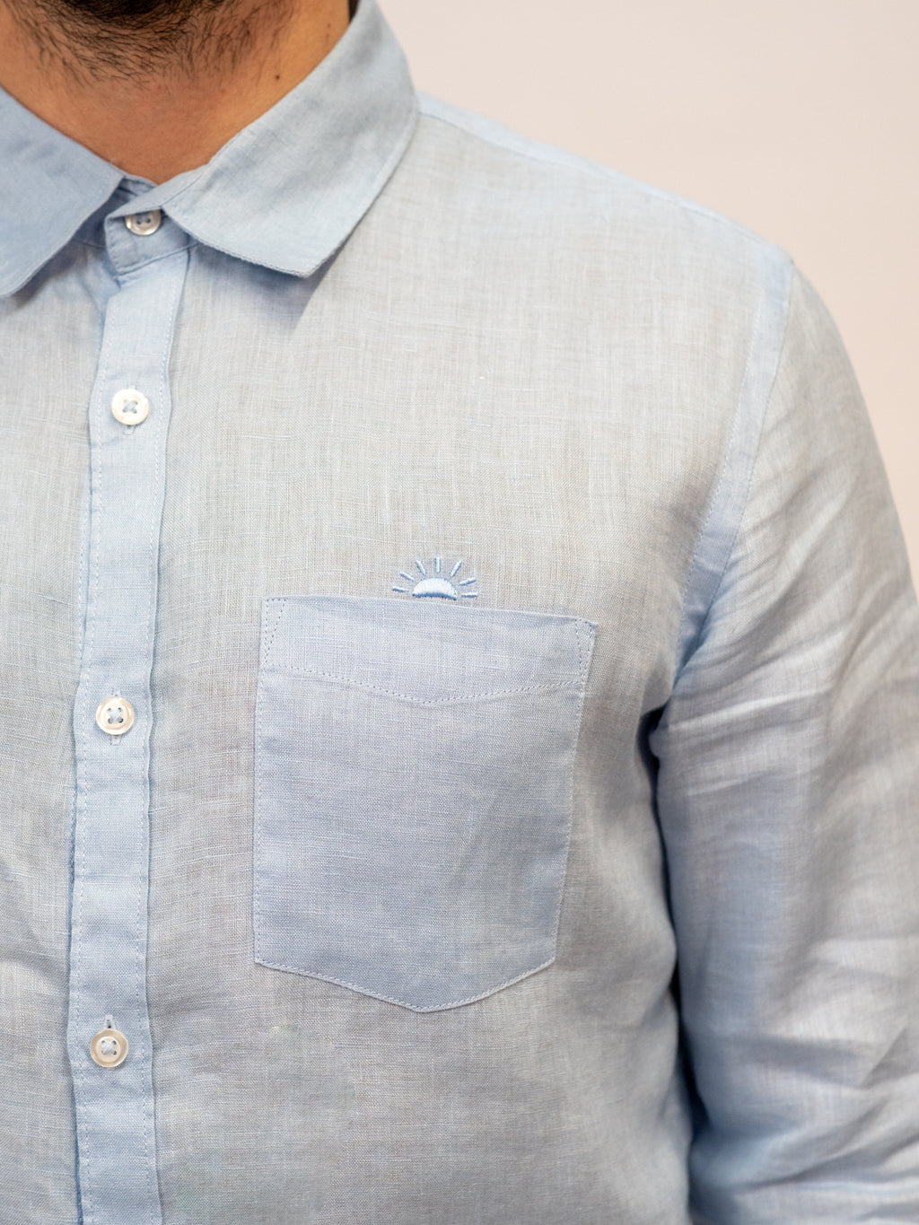 light blue SUNRISE shirt